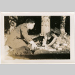 Tomoye (Nozawa) Takahashi and Tomoyuki Nozawa playing Chinese Checkers (ddr-densho-426-1716)