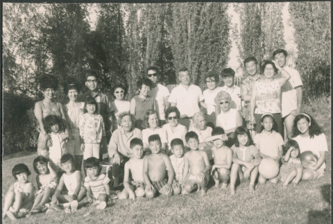 Large group of adults and children at park (ddr-densho-523-439)