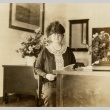 Woman seated at a desk (ddr-njpa-2-451)