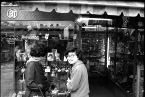Tomoye (Nozawa) Takahashi and Martha (Nozawa) Tsuchida Suzuki outside shop (ddr-densho-426-2320)