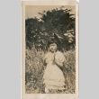 Girl in garden with large bow in hair (ddr-densho-426-1901)