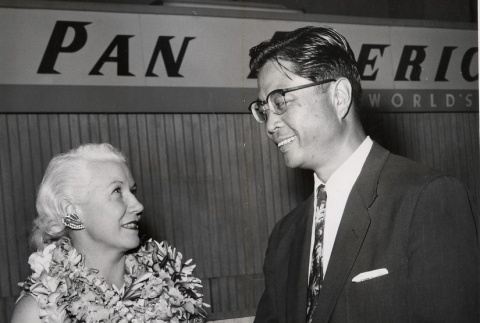 Dan Liu greeting Lois Higgins-Grote at the Honolulu Airport (ddr-njpa-2-615)