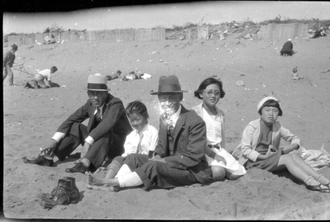 Group sitting on beach (ddr-densho-426-2015)