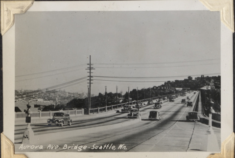 Cars crossing Aurora Bridge (ddr-densho-466-799)