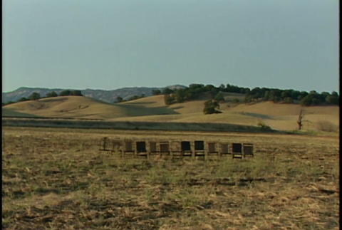 B-roll: farmland, line of chairs, tables (ddr-densho-1007-1744)