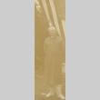Man posing in front of a flag (ddr-njpa-2-97)