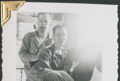 Two men in storage room (ddr-densho-434-274)