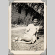 Woman sitting on lawn (ddr-densho-587-62)