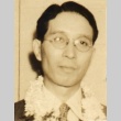 Man wearing leis (ddr-njpa-4-2441)