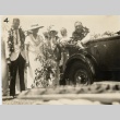 Franklin D. Roosevelt wearing leis in a car (ddr-njpa-1-1604)