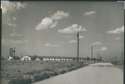 Photo of camp building and road (ddr-densho-493-104)