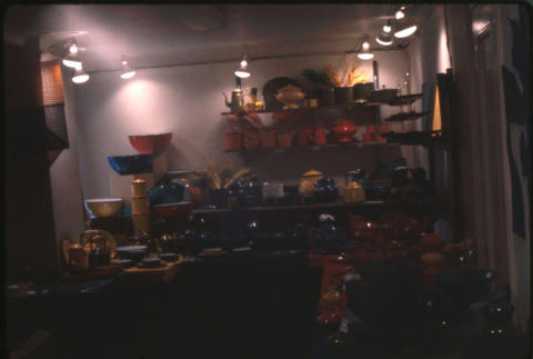 Display of enamel and lacquerware kitchen products (ddr-densho-426-346)