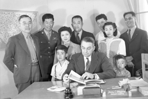 Ben Kuroki and others gathered in Harry L. Stafford's office (ddr-fom-1-353)