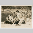 Mitsuye Takemiya and Charles Roeslin Jr. with others at beach (ddr-densho-550-39)