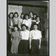 Photograph of hospital staff posing in front of the Manzanar hospital (ddr-csujad-47-255)