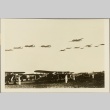 Italian planes flying over an airfield (ddr-njpa-13-771)