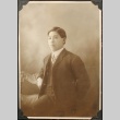 Portrait of Nikkei man in a suit (ddr-densho-259-423)