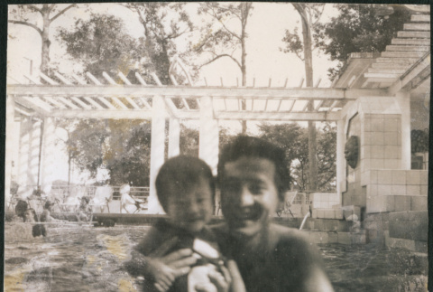 Man and baby swimming (ddr-densho-523-501)