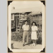 Gary Kikawa and woman beside a garden (ddr-densho-542-533)