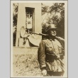 Soldier in front of a monument (ddr-njpa-13-1608)