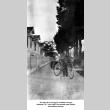 Boy with bicycle on sidewalk (ddr-ajah-6-456)