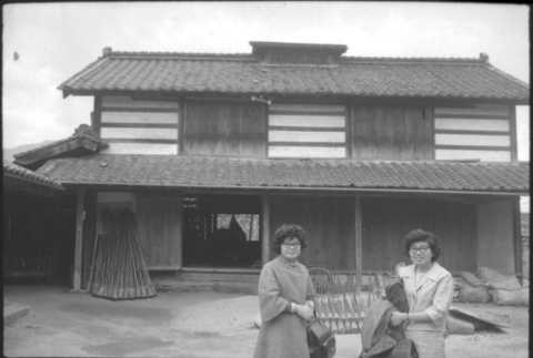 Tomoye (Nozawa)  Takahashi and Martha (Nozawa) Tsuchida Suzuki outside house (ddr-densho-426-2318)