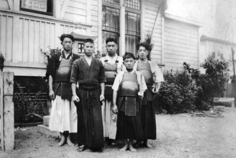 Five men in Kendo gear (ddr-ajah-3-198)