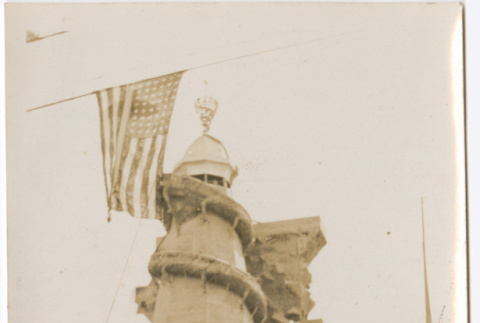 Boardwalk with large round tower and American flag (ddr-densho-426-2036)