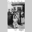 Eight women posing for photo outside house (ddr-ajah-6-118)
