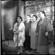 Man and three women outside building (ddr-densho-426-305)