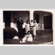 Family poses on lawn (ddr-densho-394-40)