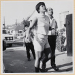 Woman, man and boy standing in driveway (ddr-densho-522-90)