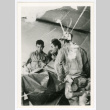 Three soldiers in a medic tent (ddr-densho-1007-298)