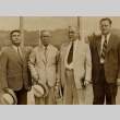 Four men posing for a photograph (ddr-njpa-1-2445)