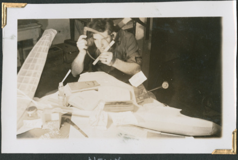 George Nelidov working on model (ddr-densho-434-102)