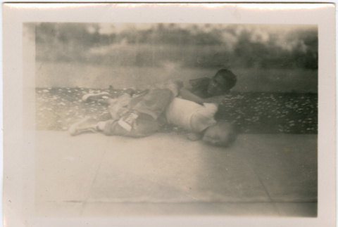 Two boys wrestling (ddr-densho-426-1127)