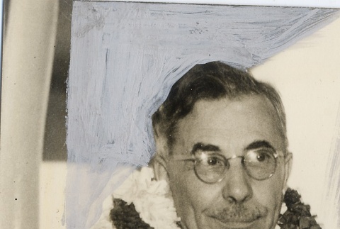 Man wearing leis (ddr-njpa-2-855)