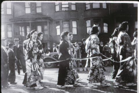 Parade group in traditional dress (ddr-densho-1007-654)