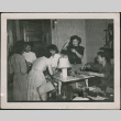 Group of women and a man around table (ddr-densho-293-158)