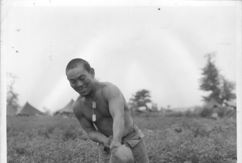 Nisei soldier digging a trench (ddr-densho-114-47)