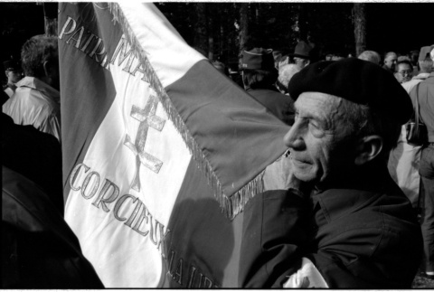 Veteran with flag (ddr-densho-1007-1300)