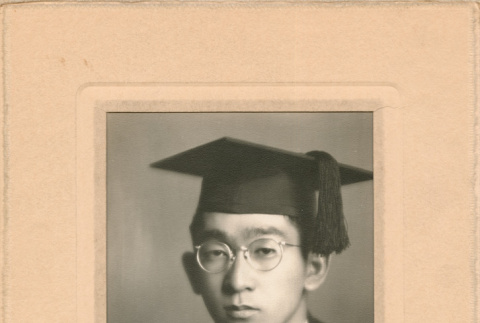 Graduation portrait of Hiroshi H. Watanabe in photo folder (ddr-densho-474-138)