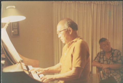 Chester Sakura Sr., playing organ (ddr-densho-523-578)