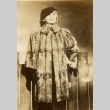 Woman posing in a fur coat (ddr-njpa-1-1550)