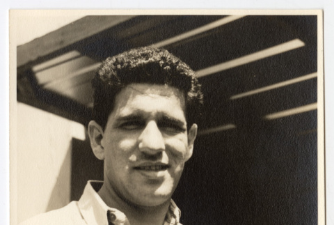 Portrait of man slightly smiling (ddr-densho-542-807)