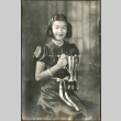 Portrait of a girl holding a trophy (ddr-densho-298-96)