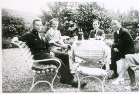 Five at outdoor table (ddr-densho-1007-767)