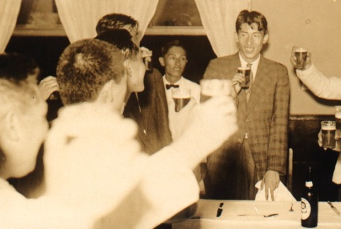 Shuhei Nishida and others raising glasses for a toast (ddr-njpa-4-1430)