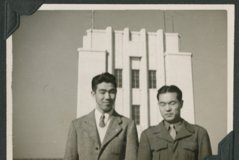 Two men pose at War Ministry Building (ddr-densho-397-133)