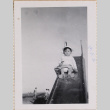 Baby on slide, with unseen person holding him from behind (ddr-densho-464-20)